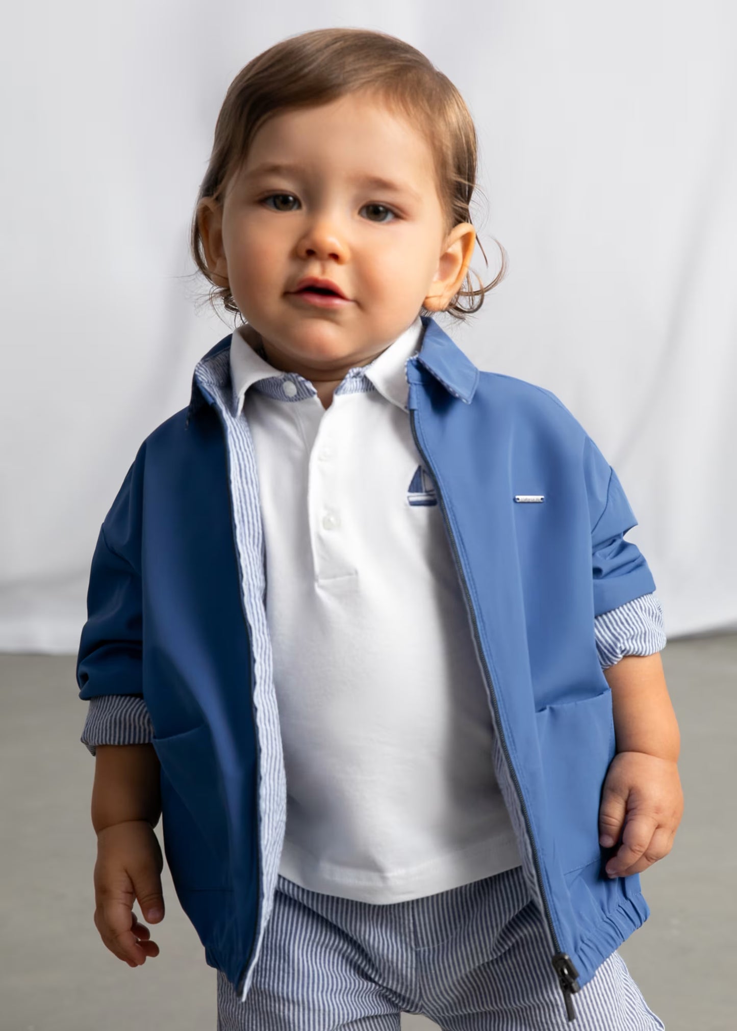 Rompevientos reversible azul vestir bebé niño