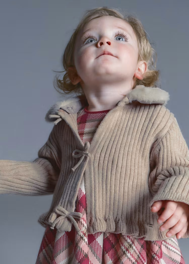 Torera beige pelo bebé niña