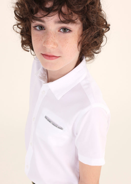 Camisa blanca de manga corta en algodón sostenible para niño jr