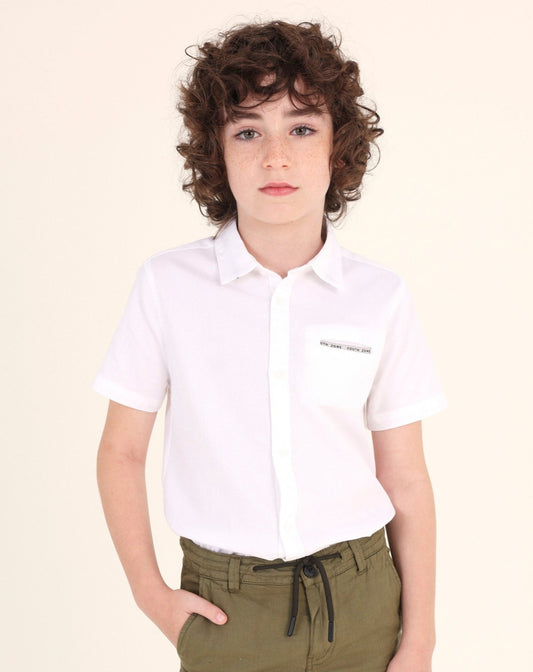 Camisa blanca de manga corta en algodón sostenible para niño jr