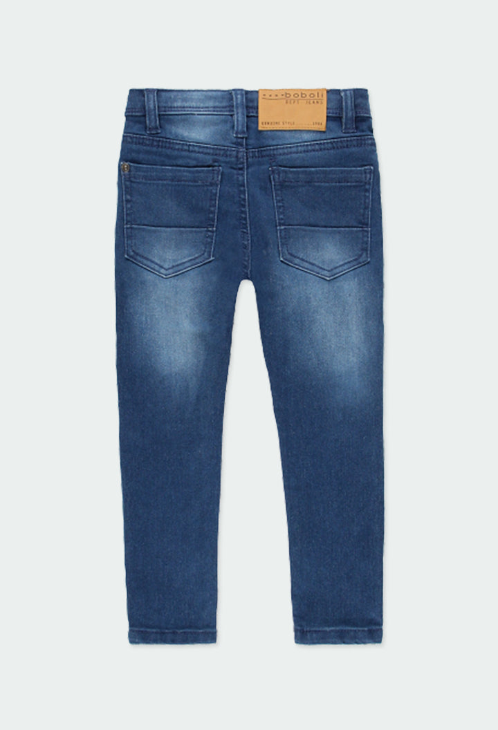 Pantalón de mezclilla stretch corte slim niño jr