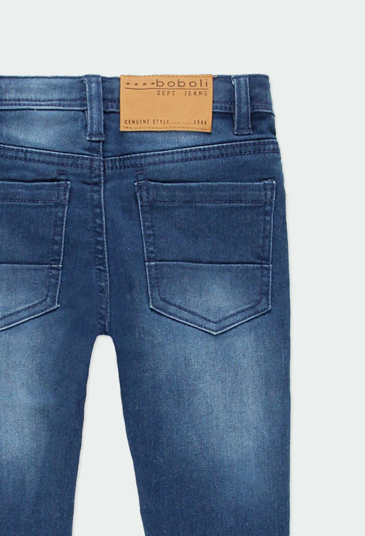 Pantalón de mezclilla stretch corte slim niño jr